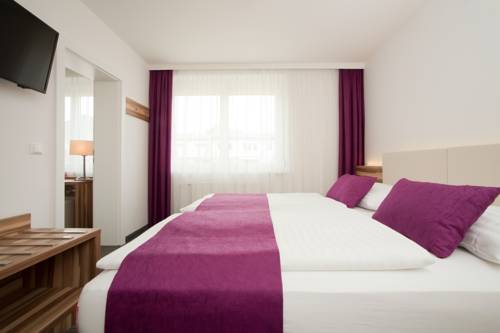 Imagen de la habitación del Hotel Happy House - Das Fröhliche Urlaubszuhause. Foto 14