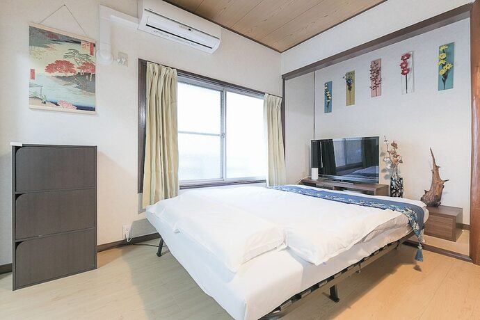Imagen de la habitación del Hotel Happy House. Foto 32