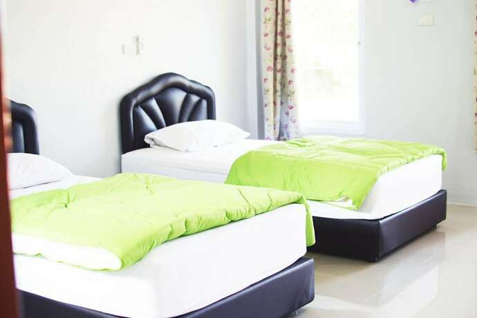 Imagen de la habitación del Hotel Happy House Resort. Foto 11