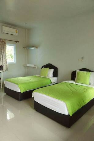 Imagen de la habitación del Hotel Happy House Resort. Foto 12
