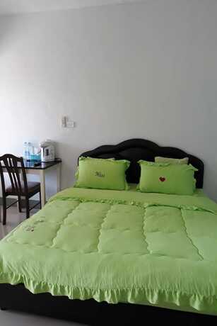 Imagen de la habitación del Hotel Happy House Resort. Foto 13