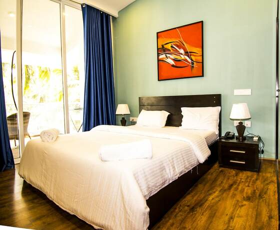 Imagen de la habitación del Hotel Happy Inch Hospitality. Foto 19