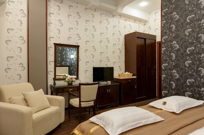 Imagen de la habitación del Hotel Happy Inn. Foto 4