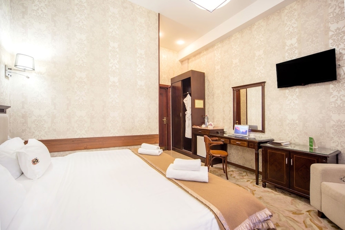 Imagen de la habitación del Hotel Happy Inn. Foto 8