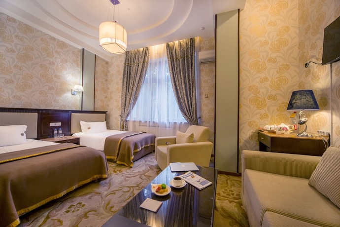 Imagen de la habitación del Hotel Happy Inn. Foto 11