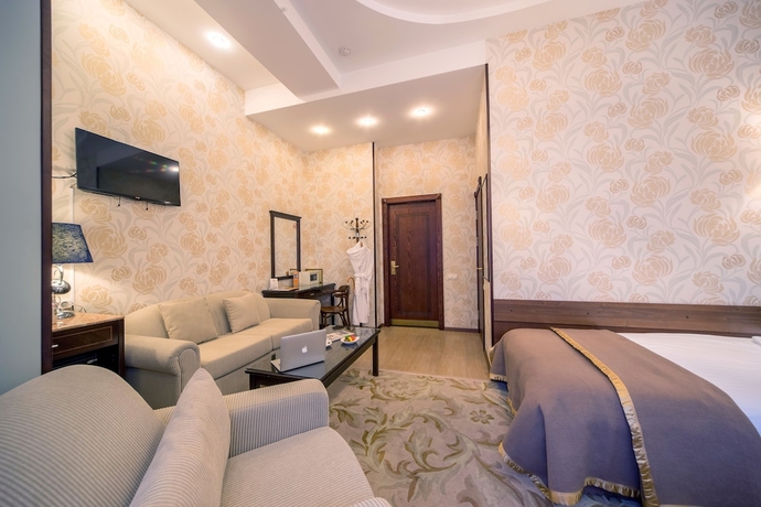 Imagen de la habitación del Hotel Happy Inn. Foto 17