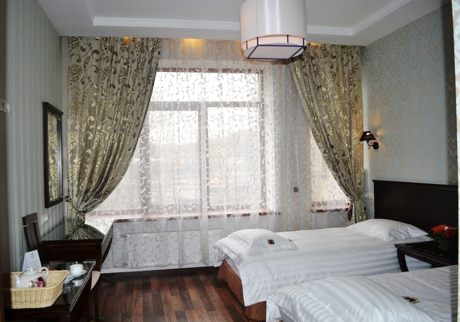 Imagen de la habitación del Hotel Happy Inn Na Sofiyskoy. Foto 3