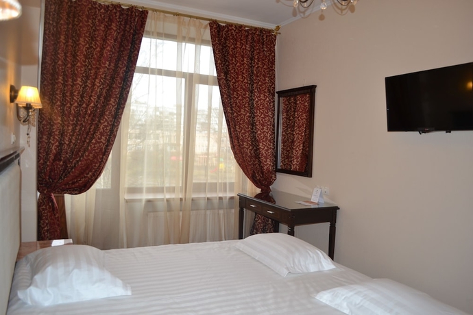 Imagen de la habitación del Hotel Happy Inn Na Sofiyskoy. Foto 7