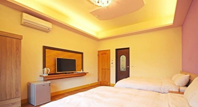 Imagen de la habitación del Hotel Happy Inn, Yuchi. Foto 17