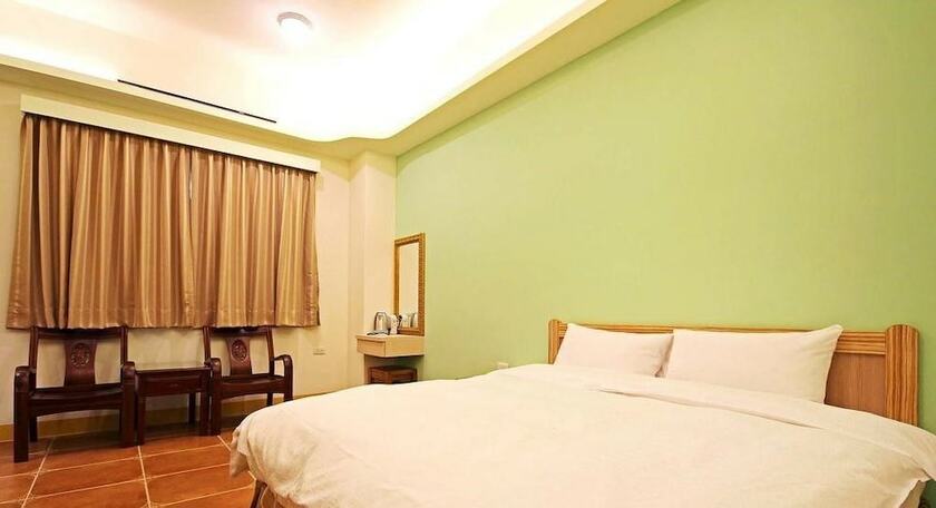 Imagen de la habitación del Hotel Happy Inn, Yuchi. Foto 22