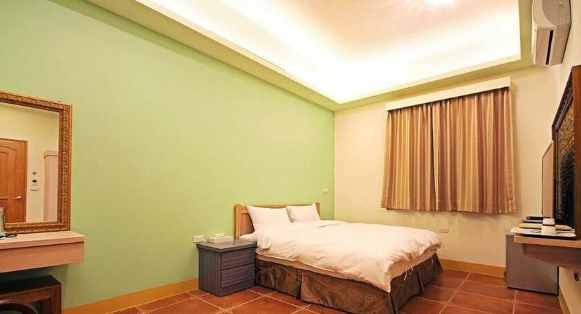Imagen de la habitación del Hotel Happy Inn, Yuchi. Foto 31