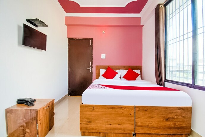 Imagen de la habitación del Hotel Happy Journey @ Patna. Foto 7