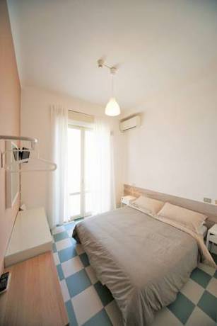 Imagen de la habitación del Hotel Happy, Marina Di Pietrasanta. Foto 13