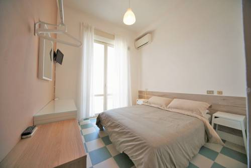 Imagen de la habitación del Hotel Happy, Marina Di Pietrasanta. Foto 14