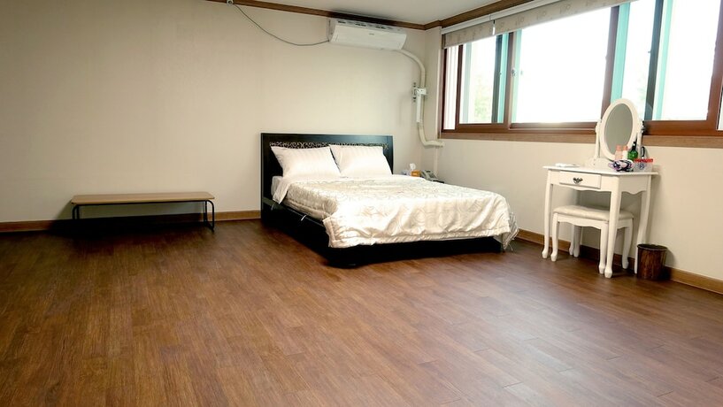 Imagen de la habitación del Hotel Happy Memory. Foto 19