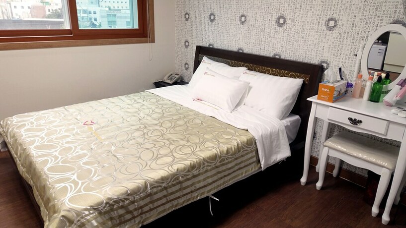 Imagen de la habitación del Hotel Happy Memory. Foto 22