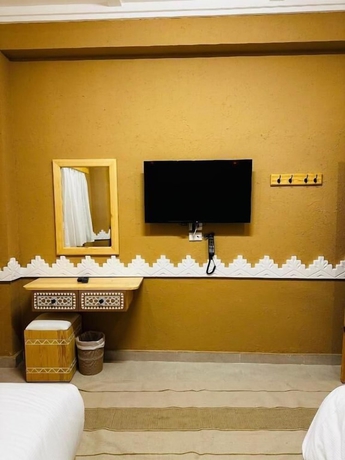Imagen de la habitación del Hotel Happy Oasis. Foto 5