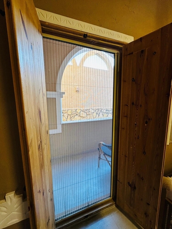 Imagen de la habitación del Hotel Happy Oasis. Foto 7