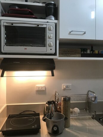 Imagen de la habitación del Hotel Happy Place @ SMDC Trees Residences. Foto 21