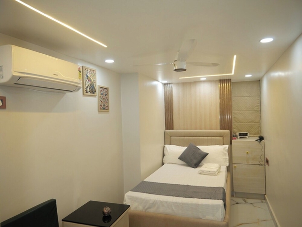 Imagen de la habitación del Hotel Happy Residency. Foto 6