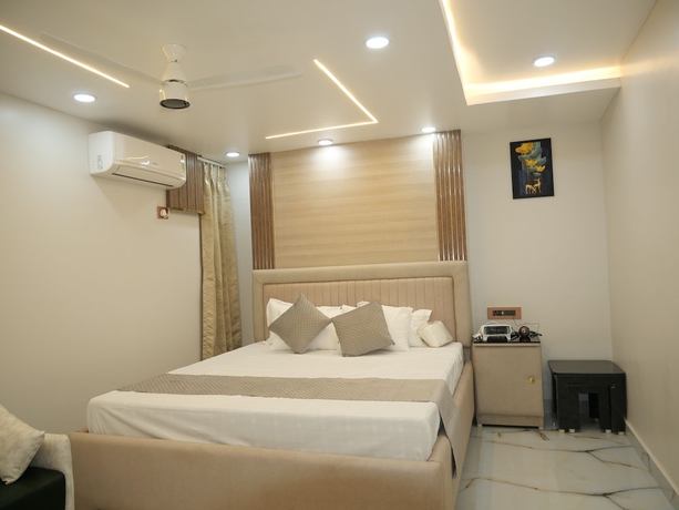 Imagen de la habitación del Hotel Happy Residency. Foto 9
