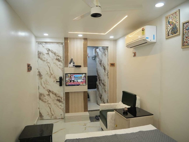 Imagen de la habitación del Hotel Happy Residency. Foto 11