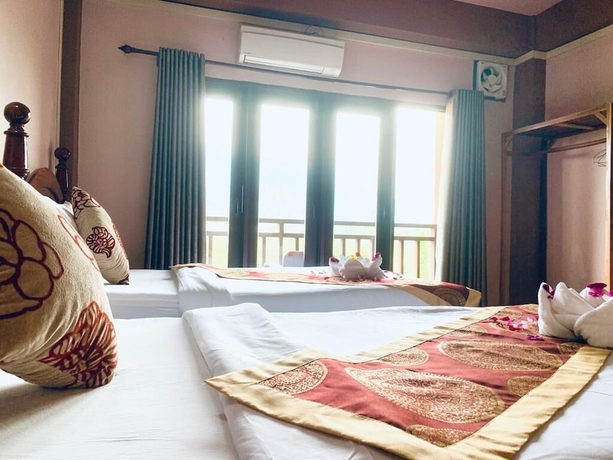 Imagen de la habitación del Hotel Happy Riverview. Foto 16