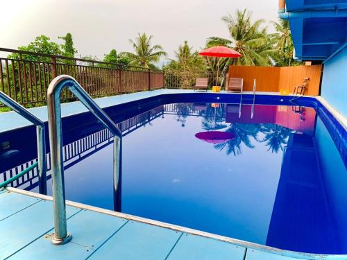 Imagen de la habitación del Hotel Happy Riverview. Foto 17