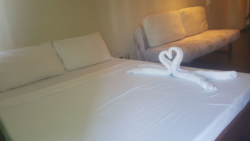 Imagen de la habitación del Hotel Happy Suites At Knightsbridge Res Makati. Foto 9