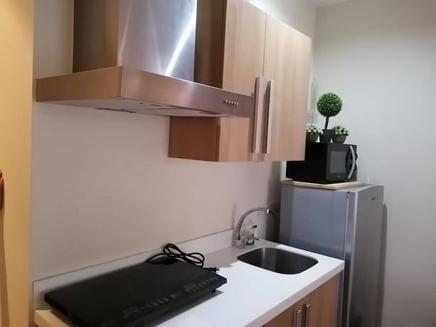 Imagen de la habitación del Hotel Happy Suites At Knightsbridge Res Makati. Foto 12