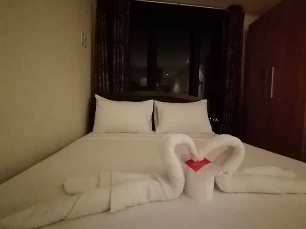 Imagen de la habitación del Hotel Happy Suites At Knightsbridge Res Makati. Foto 13