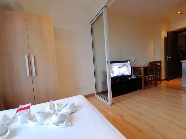 Imagen de la habitación del Hotel Happy Suites At Knightsbridge Res Makati. Foto 14
