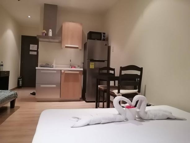 Imagen de la habitación del Hotel Happy Suites At Knightsbridge Res Makati. Foto 16