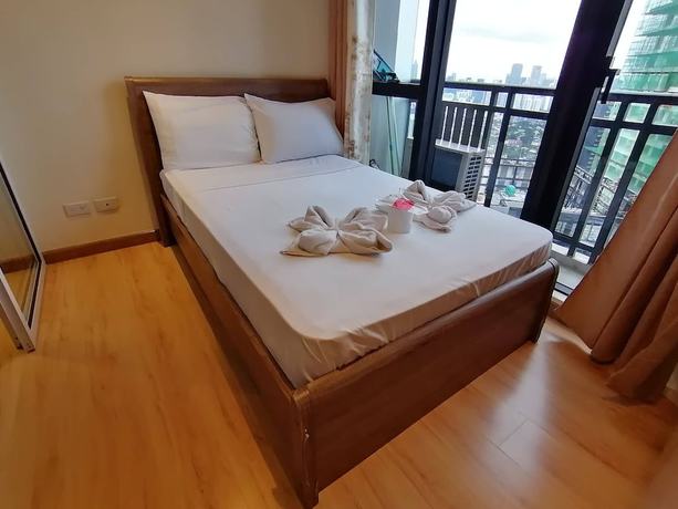 Imagen de la habitación del Hotel Happy Suites At Knightsbridge Res Makati. Foto 18