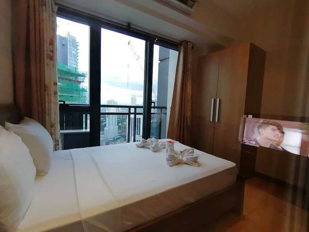 Imagen de la habitación del Hotel Happy Suites At Knightsbridge Res Makati. Foto 19