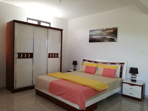 Imagen de la habitación del Hotel Happy Villa. Foto 6