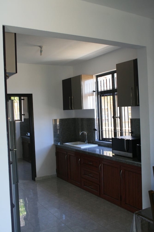 Imagen de la habitación del Hotel Happy Villa. Foto 9