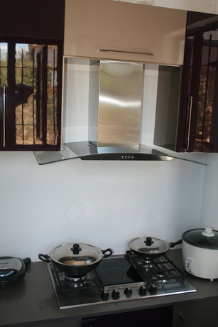 Imagen de la habitación del Hotel Happy Villa. Foto 10