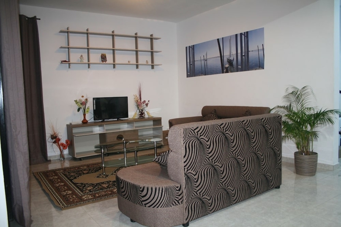 Imagen de la habitación del Hotel Happy Villa. Foto 13