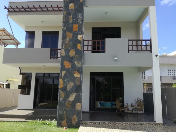 Imagen de la habitación del Hotel Happy Villa. Foto 14