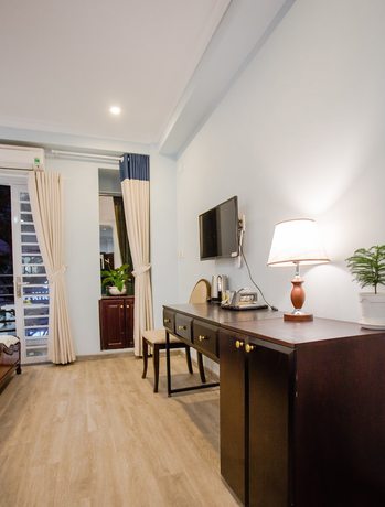 Imagen de la habitación del Hotel Happyhomes Saigon Central. Foto 3