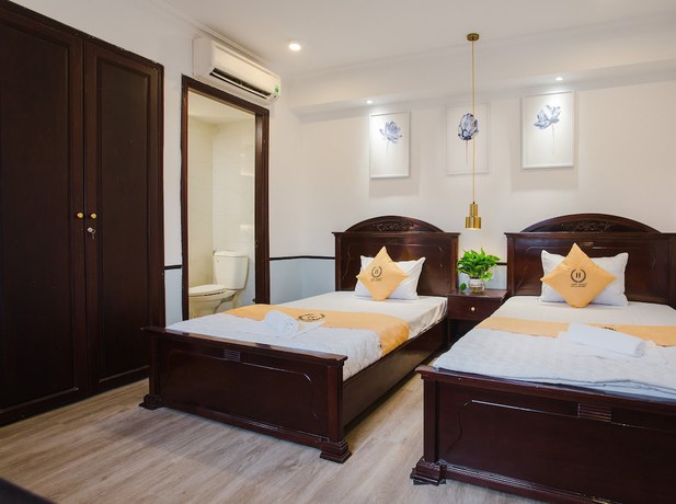 Imagen de la habitación del Hotel Happyhomes Saigon Central. Foto 4