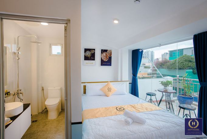Imagen de la habitación del Hotel Happyhomes Saigon Central. Foto 5
