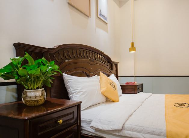 Imagen de la habitación del Hotel Happyhomes Saigon Central. Foto 7