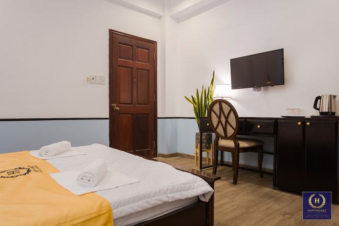Imagen de la habitación del Hotel Happyhomes Saigon Central. Foto 8