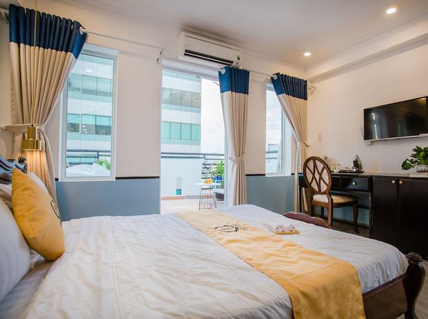Imagen de la habitación del Hotel Happyhomes Saigon Central. Foto 9