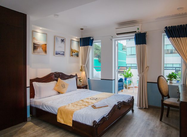 Imagen de la habitación del Hotel Happyhomes Saigon Central. Foto 12