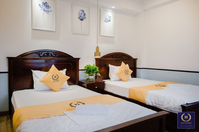Imagen de la habitación del Hotel Happyhomes Saigon Central. Foto 16