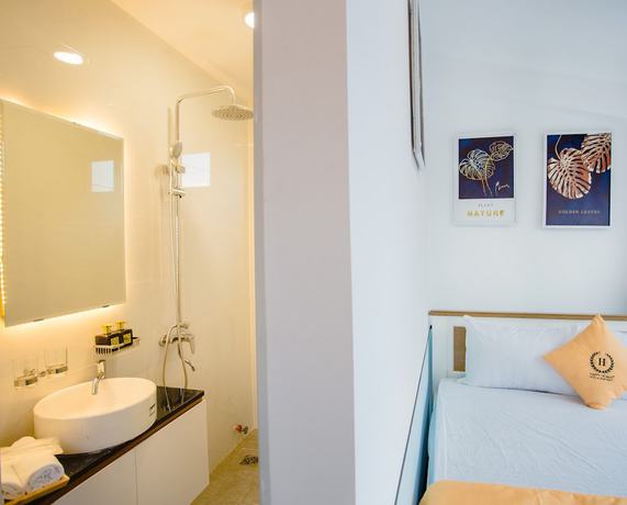 Imagen de la habitación del Hotel Happyhomes Saigon Central. Foto 20