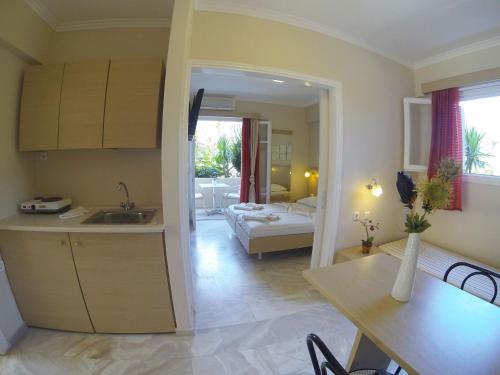 Imagen de la habitación del Hotel Happyland Apartments. Foto 6